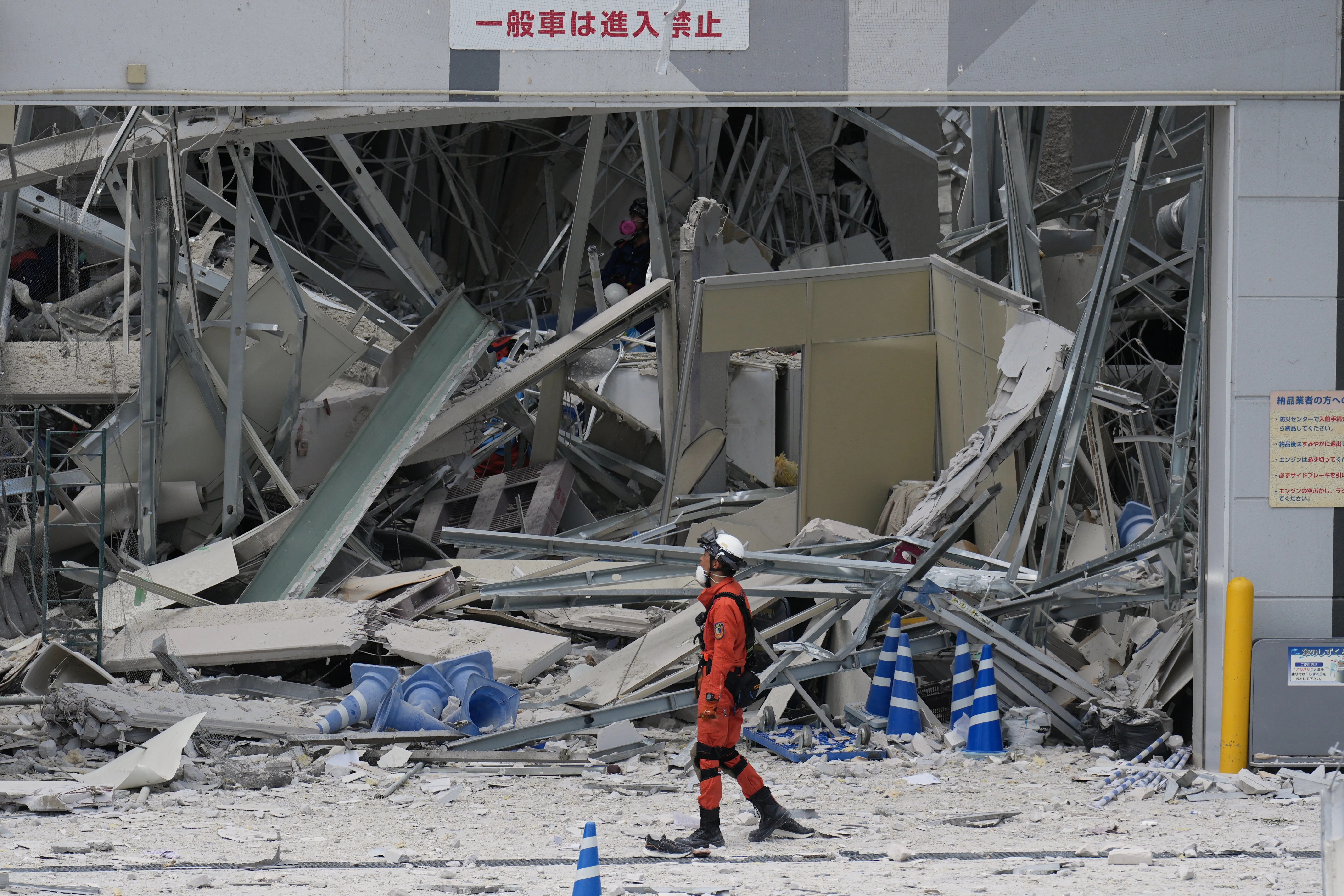 Death Toll Rises To 18 As Rescuers Comb Through Quake Rubble In Southwestern Japan