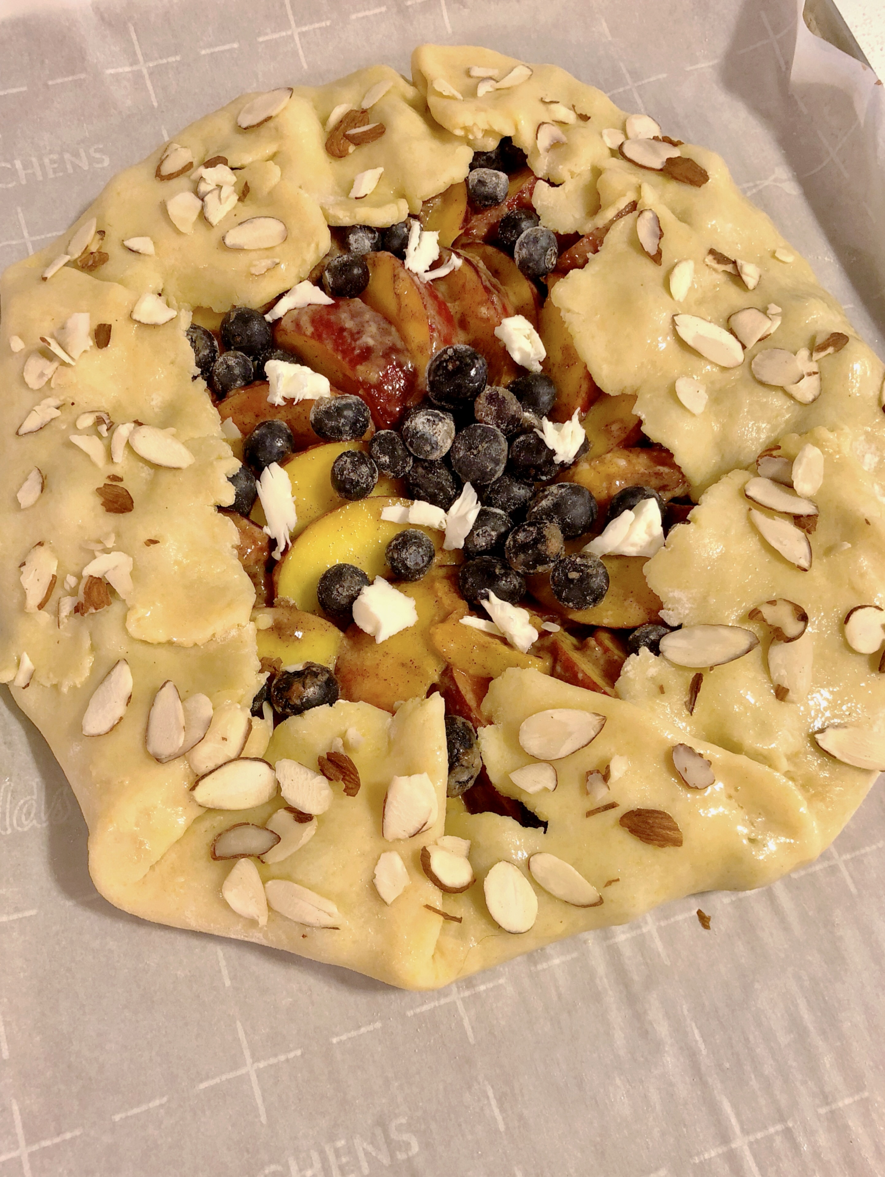 Egg wash and sliced almonds for a beautiful finish!