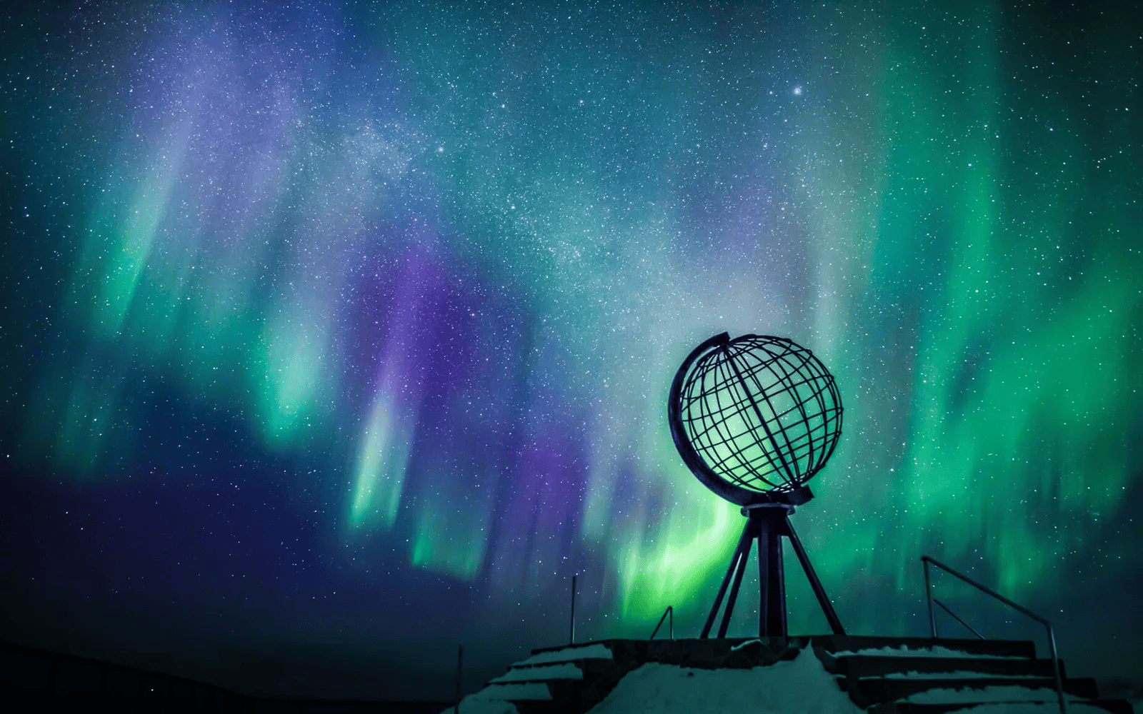 Northern Lights over the snowy North Cape in Norway