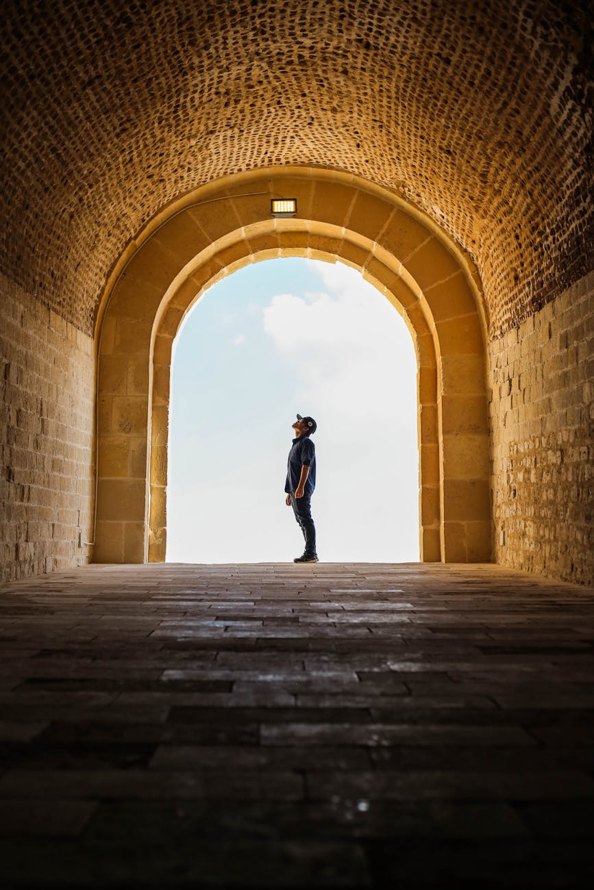 man standing inside a temple