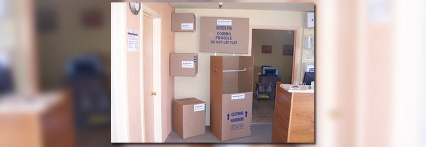 Hand trucks with boxes and packing materials