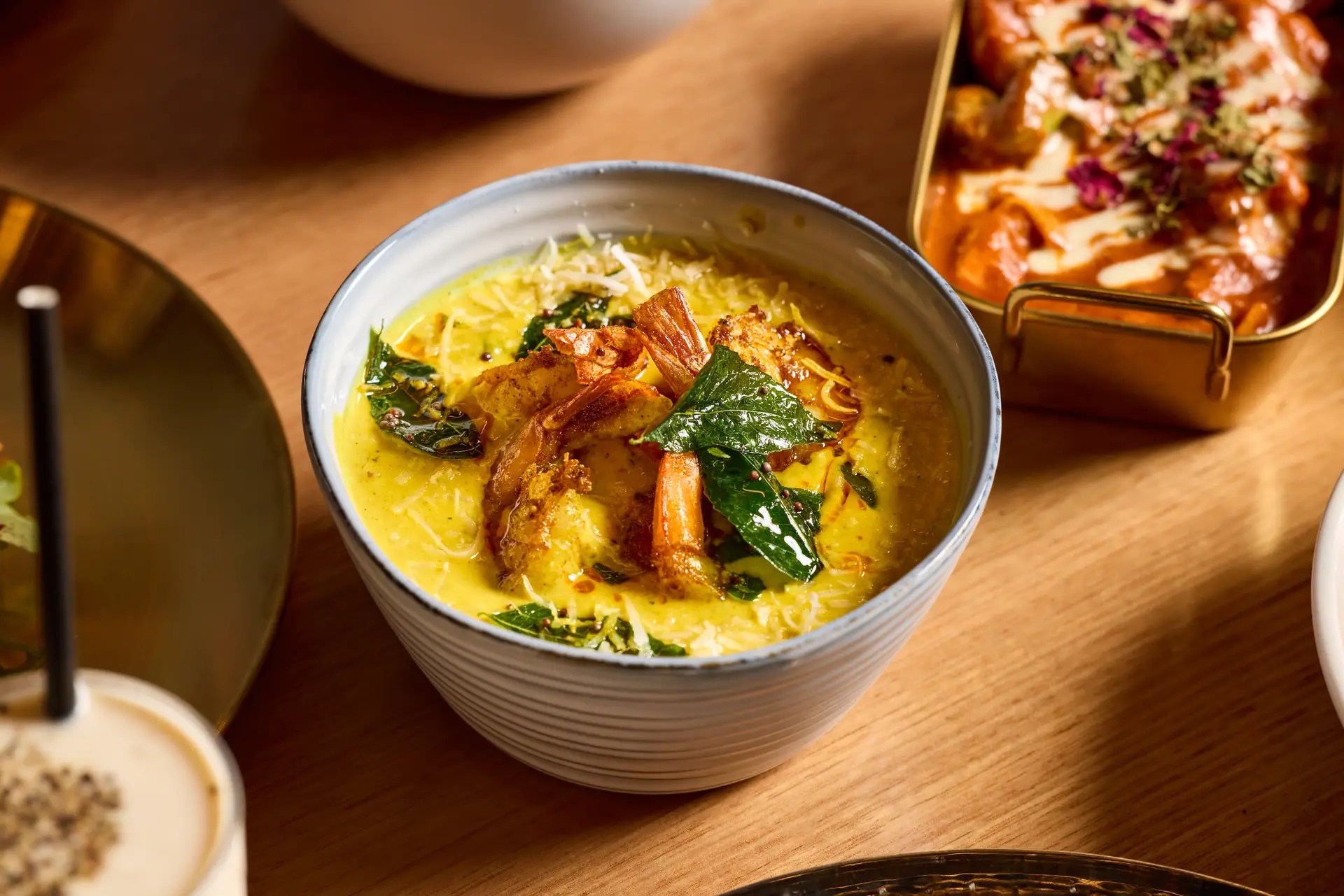Bowl of curry with garnishes