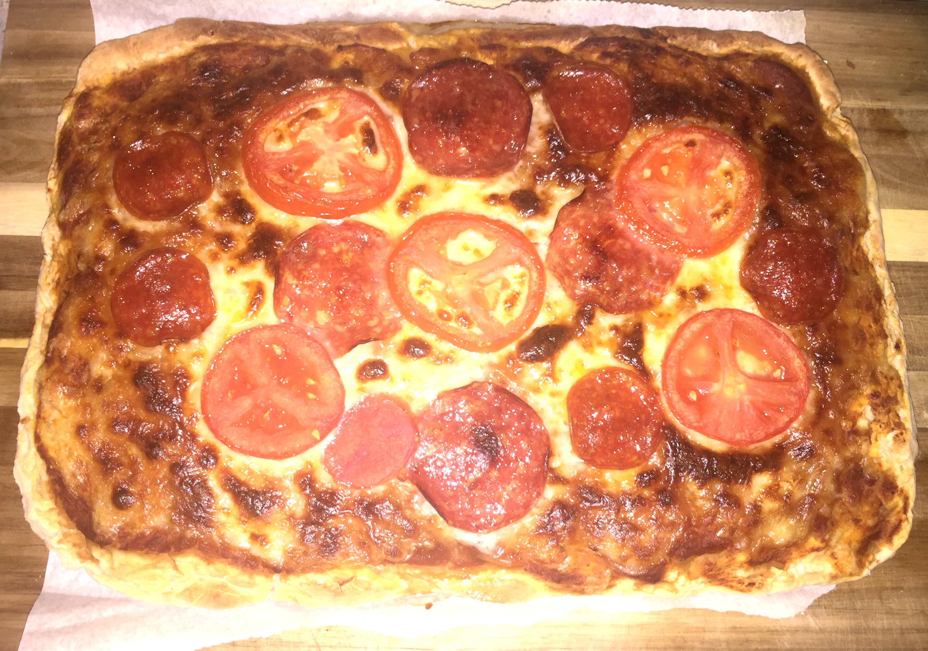 Slightly over-baked finished pizza. Awesomely yummy!