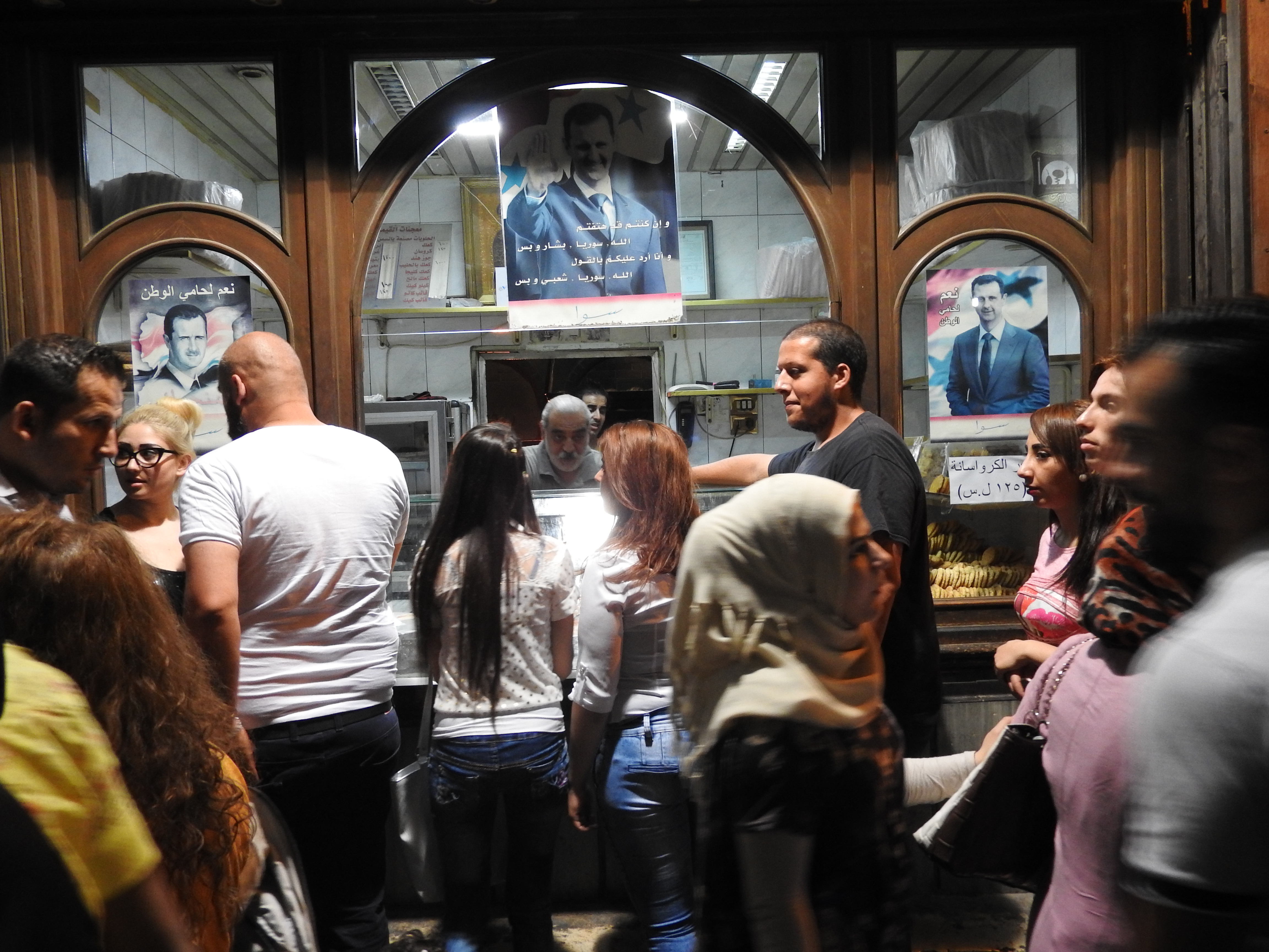 The croissant stand in Aamarie district of Thomas Gate is known not only to Damascenes but visitors from other areas of Syria. While prices for most goods have risen all across Syria, the stand keeps its prices low: 125 Syrian pounds per sumptuous croissant. On the first day of ‘Eid celebrations the stand is packed. https://www.mintpressnews.com/damascus-life-returns-5-years-after-nato-destabilization-efforts/218601/