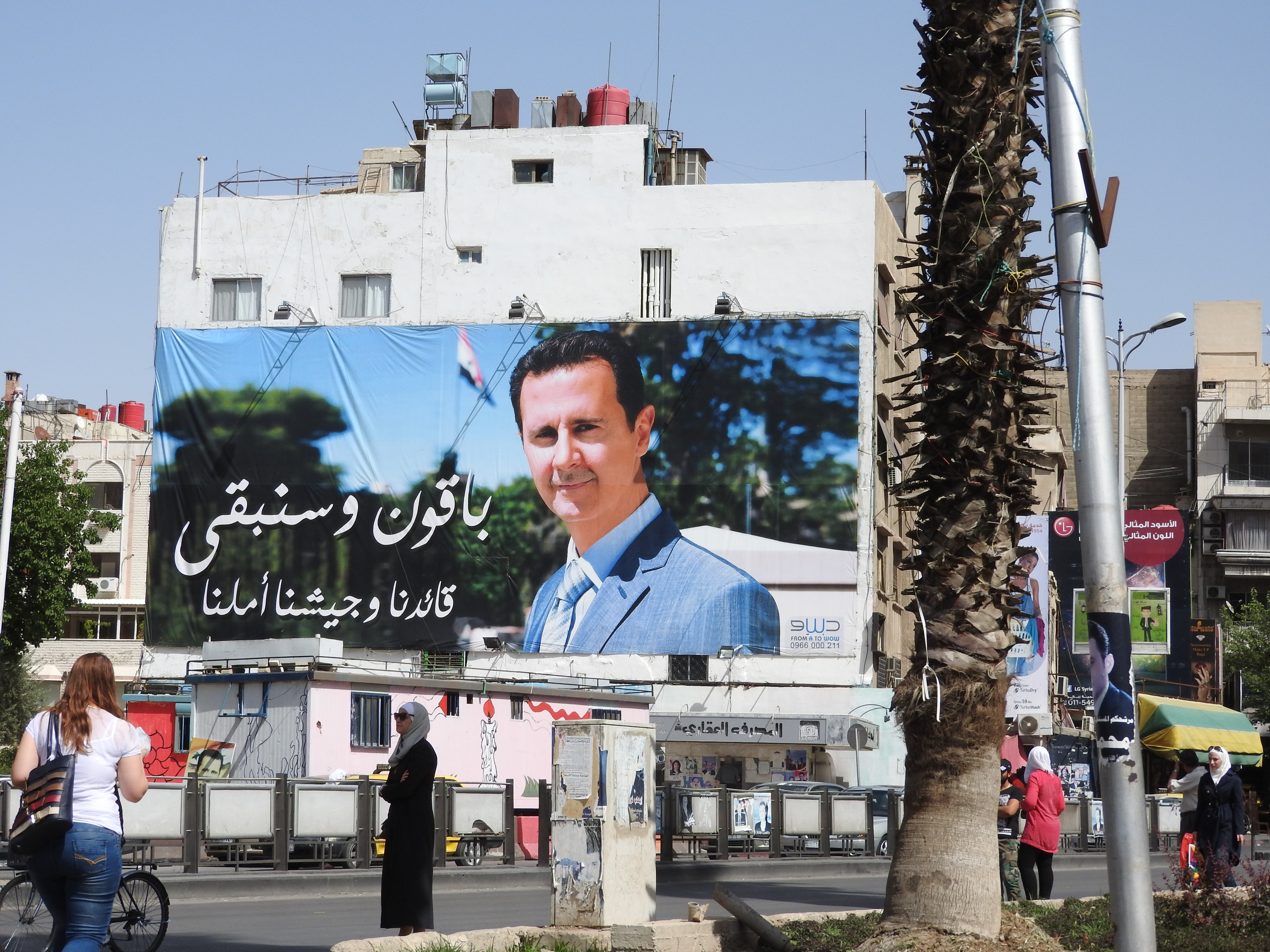 We are here and will stay here. Our leader and our army is our hope.” The sign speaks the sentiment of Syrians I have met in Aleppo, Homs, Latakia, Sweida, Ma’loula, and Damascus. The popularity of President al-Assad has even been admitted by western sources in recent years as at least 70%, although popular sentiment on the streets would put the figure even higher. https://www.mintpressnews.com/damascus-life-returns-5-years-after-nato-destabilization-efforts/218601/