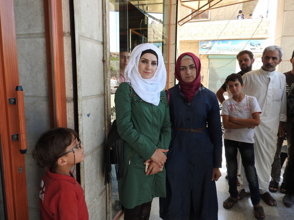 The roughly 65,000 people of Nubl and Zahra’a villages, under siege from terrorist factions of the so-called FSA, al-Nusra, and affiliated factions for three and a half years, were on February 3, 2016, liberated from the choke-hold which strangled them. Zeinab Sharbo, 25, and Mounthaher Khatib, 26, each have young children who suffered for want of food and basic elements of life, and who were traumatized by the terrorists’ bombing of the villages. Although corporate media, when deigning to mention the villages, usually focused on their predominately Shia composition, Sunnis also live in the villages. According to Zeinab, “Sectarianism wasn’t a problem before, we were brothers and sisters, we intermarried with neighbouring villages.” https://ingaza.wordpress.com/2016/09/22/aleppo-and-nearby-villages-ravaged-by-the-wests-moderate-terrorists-photo-essay/