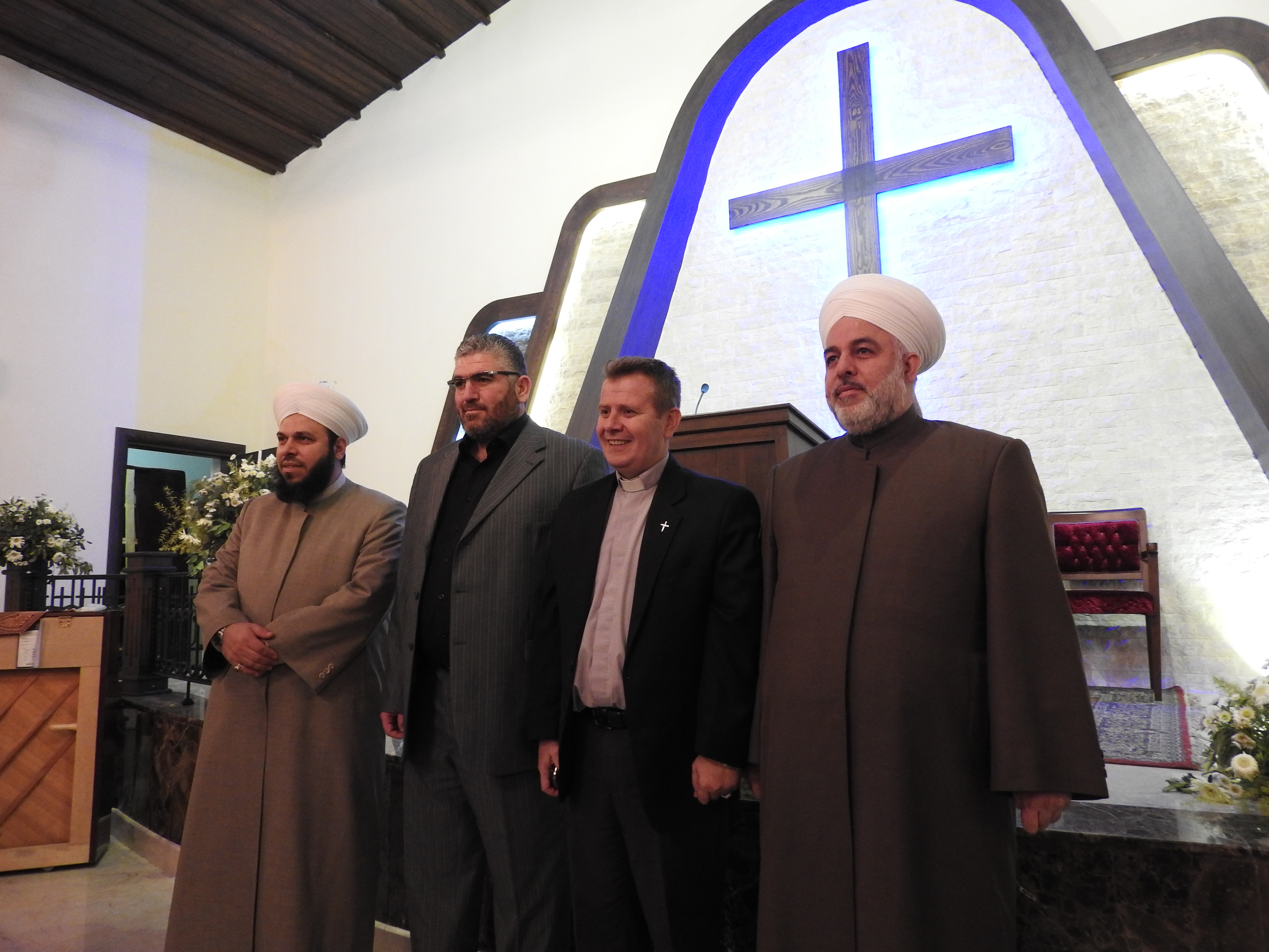 Rev. Ibrahim Nseir, pastor of the Arab Evangelical Presbyterian Church of Aleppo, with three top Sunni scholars and leaders, Dr. Rami Obeid, Rabih Kukeh, Sheikh Ahmed Ghazeli, who reject Wahhabism. Dr. Kukeh said of the terrorist factions: “Those who are killing the Sunnis are the same who claim that they are defending the Sunnis.” Nov. 2, 2016. https://www.mintpressnews.com/aleppo-how-us-saudi-backed-rebels-target-every-syrian/222594/