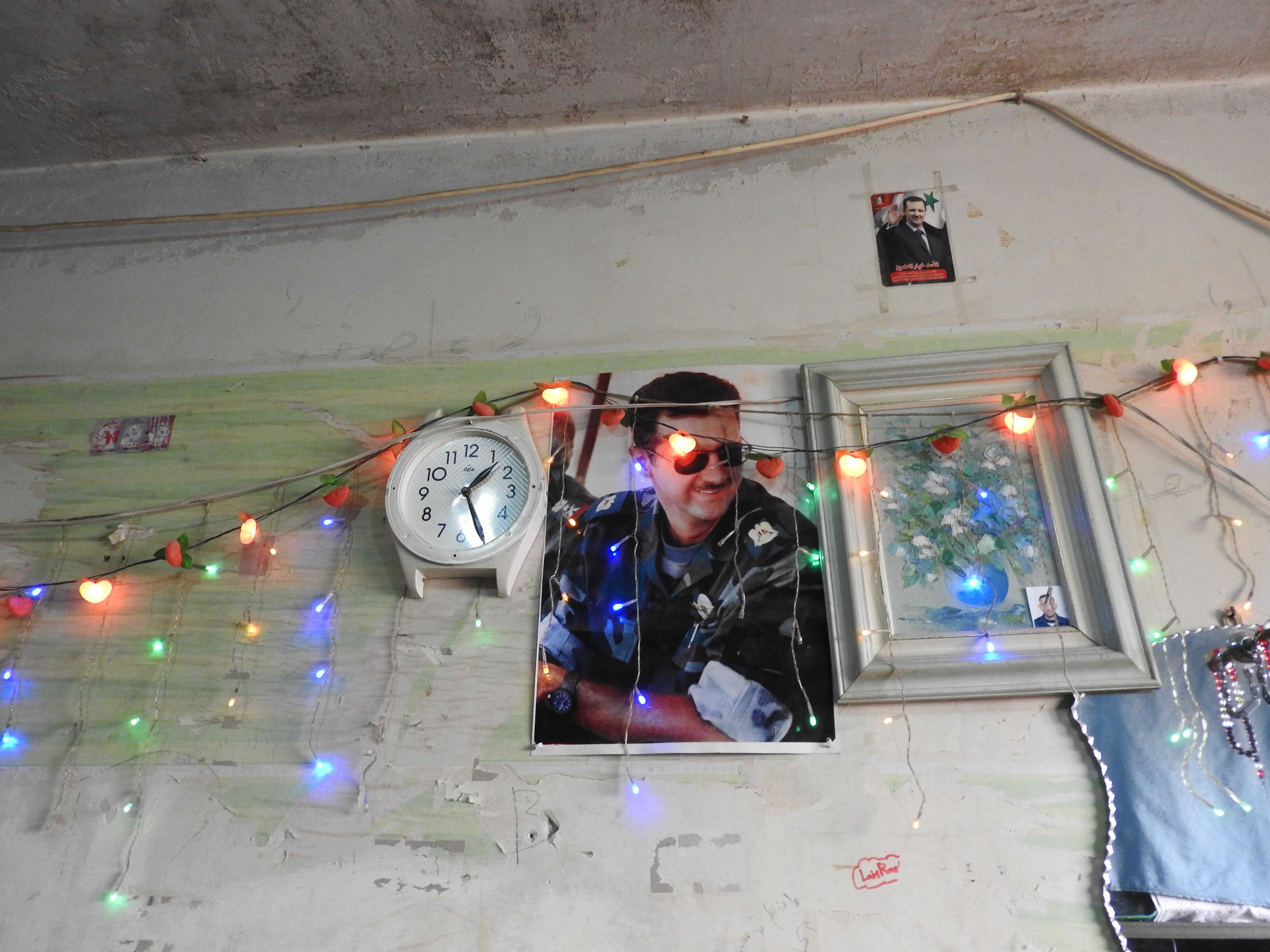 Family from Sukkari, Aleppo's east, housed in Aleppo University residences, which by November 2016 had been housing well over 10,000 internally displaced Syrians from areas of Aleppo and its countryside for around 4 or more years. One of the residences was hit by a terrorist missile the week prior, killing four from one family. From: https://ingaza.wordpress.com/2016/11/24/overview-of-latest-month-long-visit-to-syria-aleppo-and-damascus/