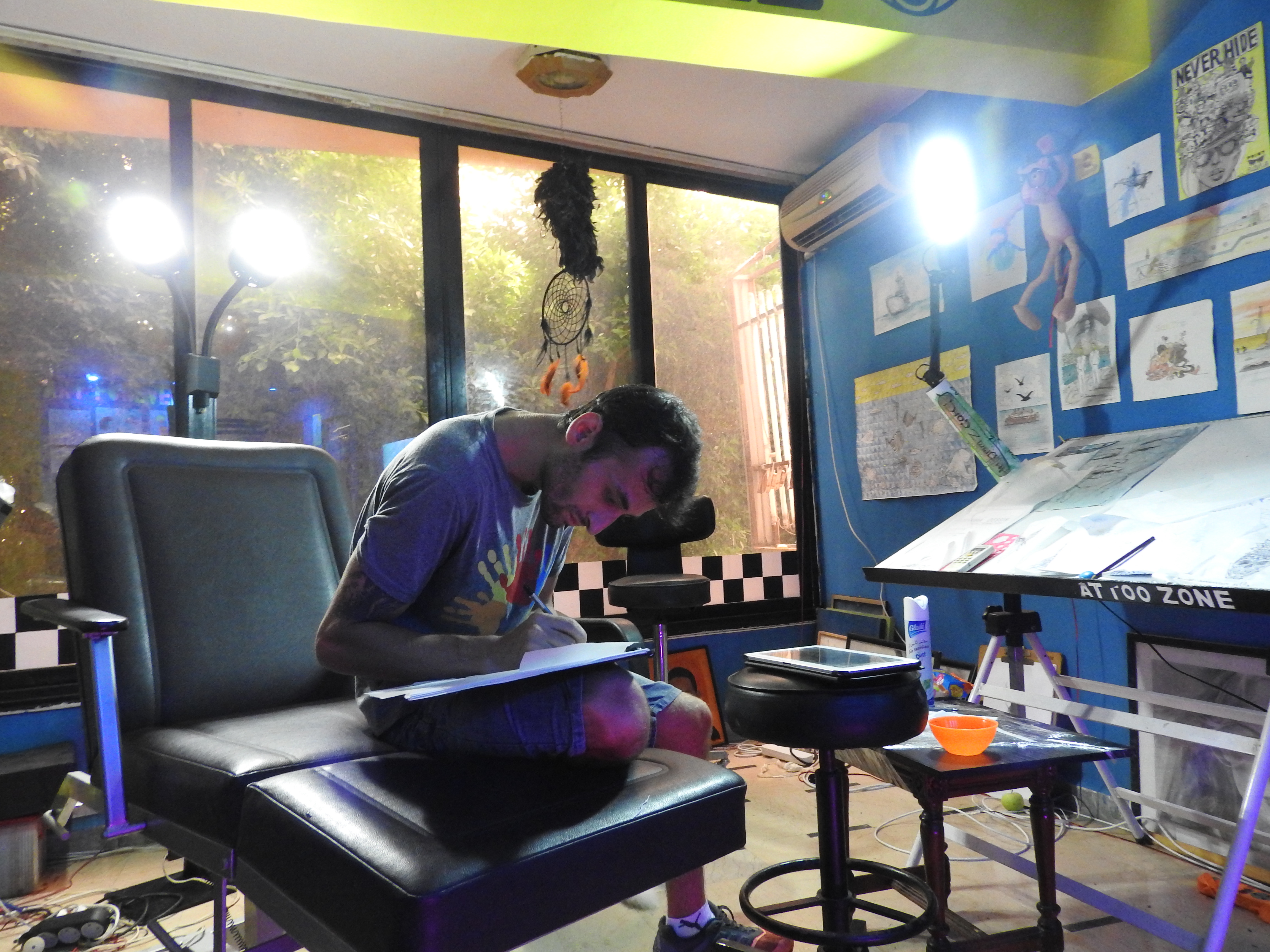 Latakia tattoo artist studio, summer 2016, getting my Syria tattoo.