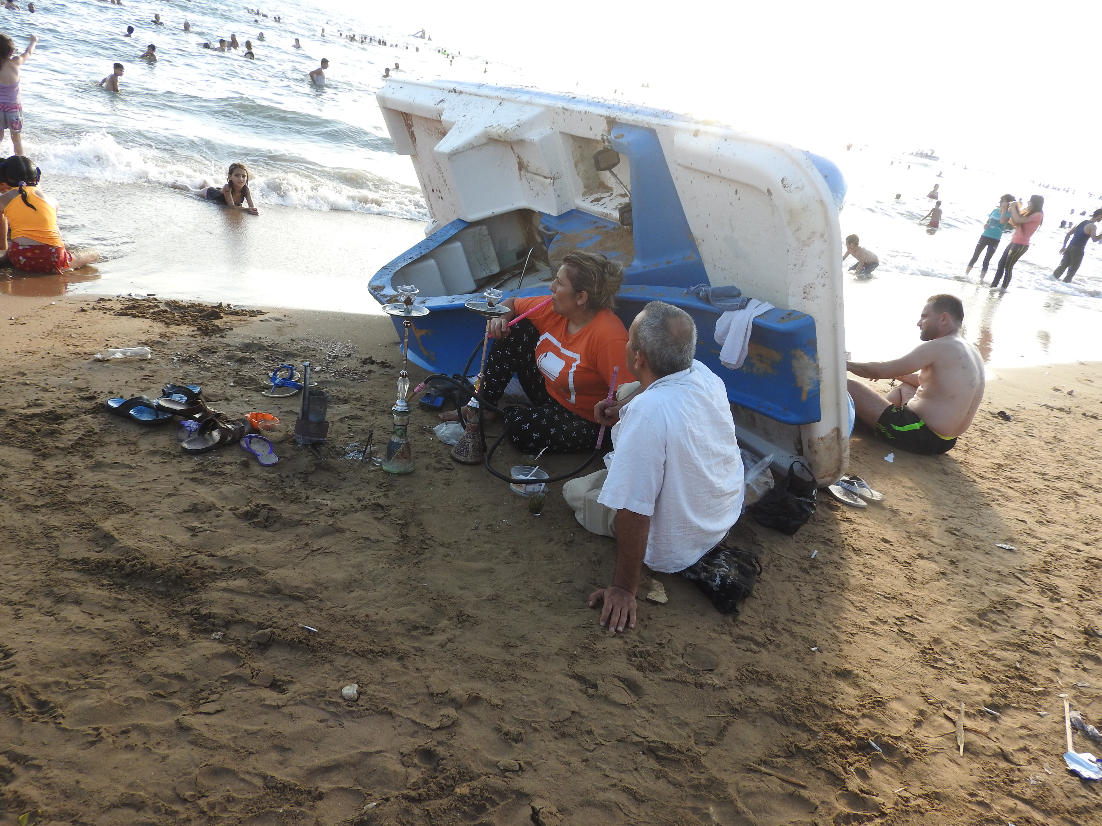 In 2016, I visited Tartous, to see the transportation terminal which was attacked by Western-backed terrorists on May 23rd, the same morning a transport hub (and street and hospital) in Jableh (which I also visited) was attacked. Tartous houses 1 million internally-displaced from all over Syria, including people from Deir ez-Zor, Raqqa, Aleppo, Homs, and elsewhere, according to the Governor of Aleppo (as of mid-2016), who said the city is known as "mini-Syria" in recent years due to its hosting of Syrians from all over. "The 1 million IDPs share Tartous' resources, schools, and hospitals with 1 million inhabitants." They are not housed in tents and camps, but in schools/other buildings-turned refugee centres, as well as houses. I visited one of these centres while in Tartous, also visiting centres in Latakia, Aleppo, Damascus over the past few years. While in Tartous I saw an endless sea of posters of martyred soldiers, billboards listing their names, to give respect to their defense of Syria. I was also treated with an unplanned visit to the sea, where I saw normal beach scenes, and more: Syrians of varying ages and faiths, living, loving, resisting the war of terror on their country. While there, my host made sure to note: "Do not think these people haven't suffered.There isn't a house here that hasn't lost a family member or relative," she said of Syria's fight against terrorism and for the restoration of peace and security. Videos here: https://www.facebook.com/EvaBoBeeva/posts/1611030225573632