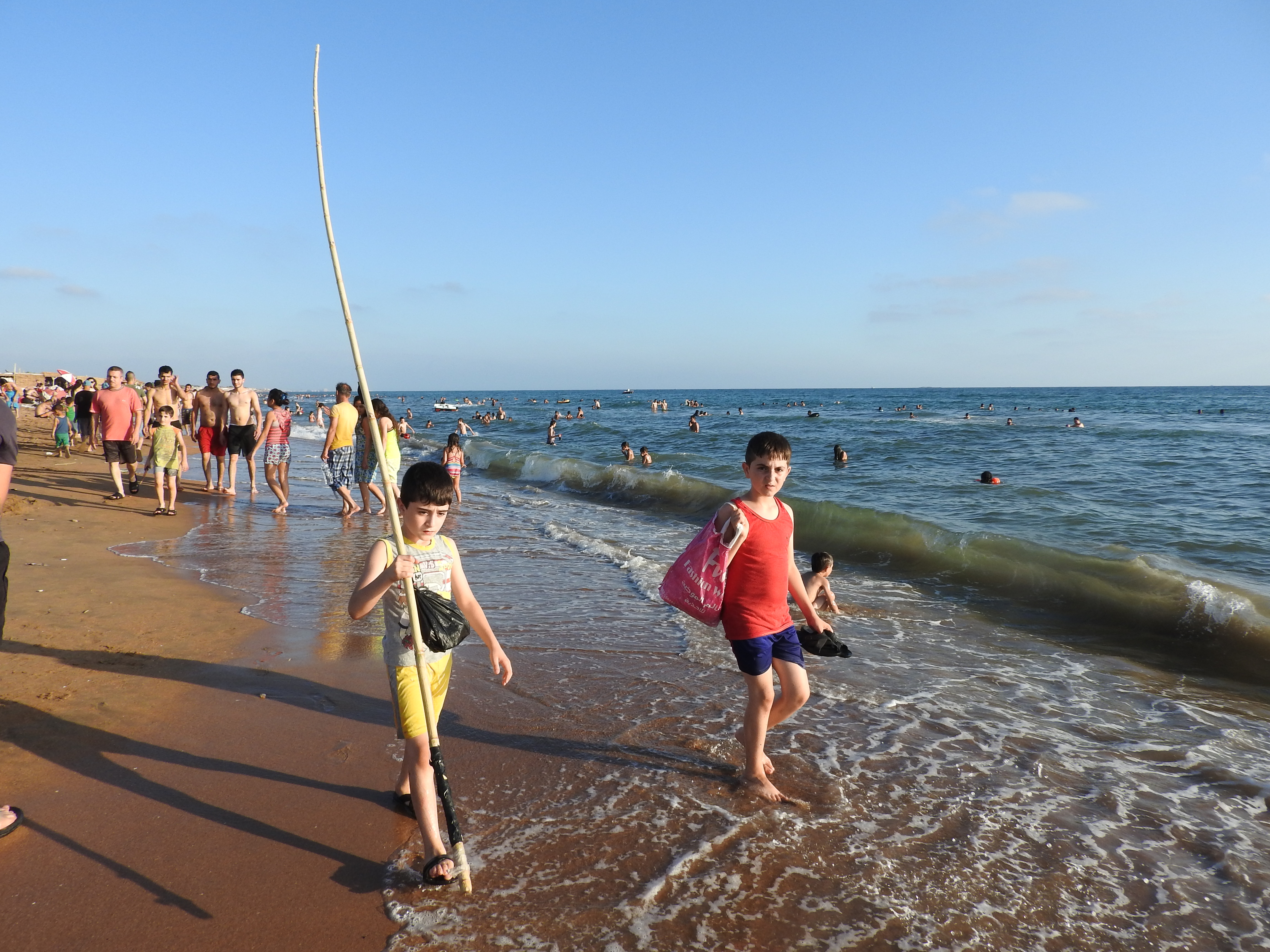 In 2016, I visited Tartous, to see the transportation terminal which was attacked by Western-backed terrorists on May 23rd, the same morning a transport hub (and street and hospital) in Jableh (which I also visited) was attacked. Tartous houses 1 million internally-displaced from all over Syria, including people from Deir ez-Zor, Raqqa, Aleppo, Homs, and elsewhere, according to the Governor of Aleppo (as of mid-2016), who said the city is known as "mini-Syria" in recent years due to its hosting of Syrians from all over. "The 1 million IDPs share Tartous' resources, schools, and hospitals with 1 million inhabitants." They are not housed in tents and camps, but in schools/other buildings-turned refugee centres, as well as houses. I visited one of these centres while in Tartous, also visiting centres in Latakia, Aleppo, Damascus over the past few years. While in Tartous I saw an endless sea of posters of martyred soldiers, billboards listing their names, to give respect to their defense of Syria. I was also treated with an unplanned visit to the sea, where I saw normal beach scenes, and more: Syrians of varying ages and faiths, living, loving, resisting the war of terror on their country. While there, my host made sure to note: "Do not think these people haven't suffered.There isn't a house here that hasn't lost a family member or relative," she said of Syria's fight against terrorism and for the restoration of peace and security. Videos here: https://www.facebook.com/EvaBoBeeva/posts/1611030225573632