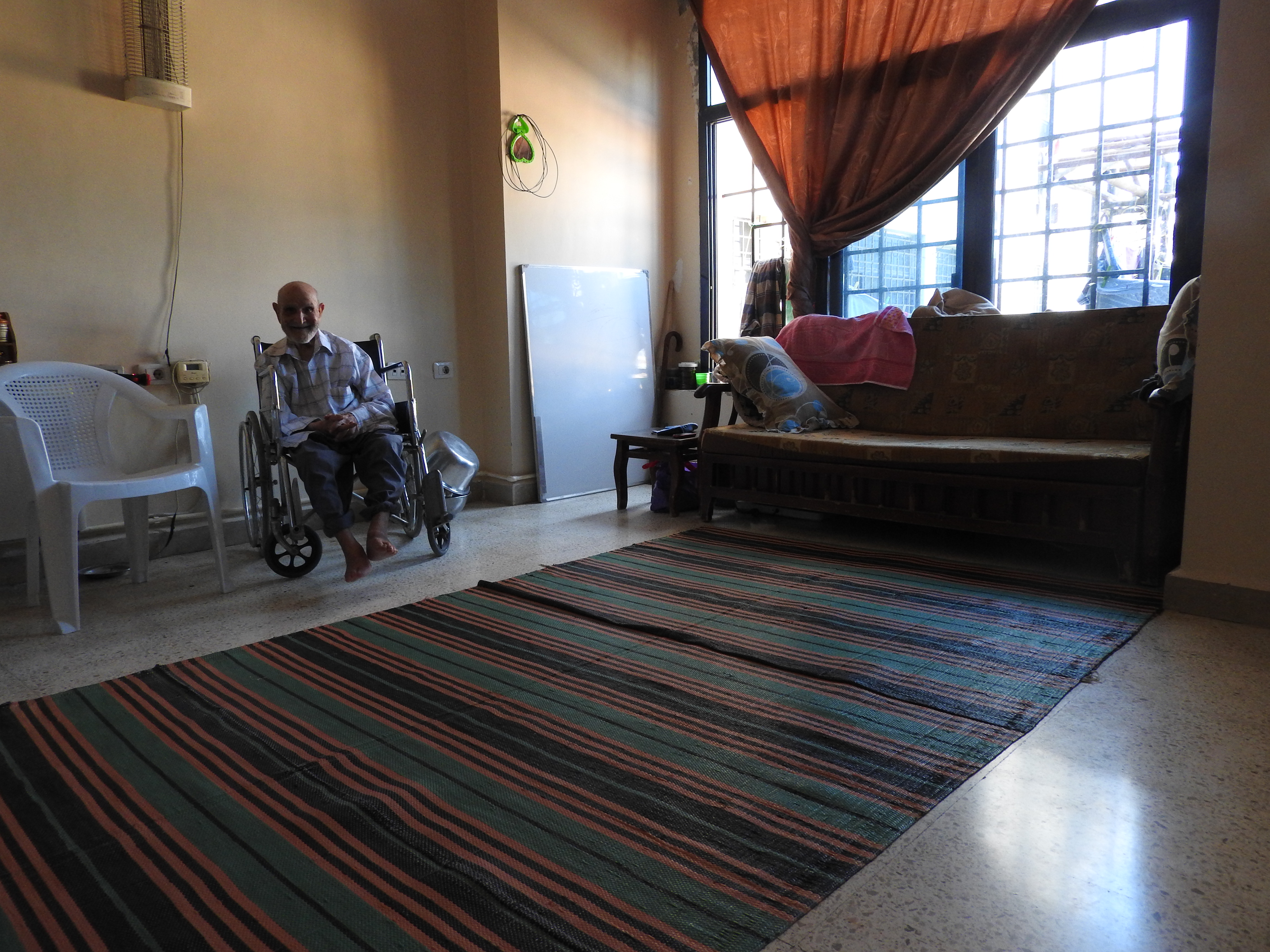 In 2016, I visited Tartous, to see the transportation terminal which was attacked by Western-backed terrorists on May 23rd, the same morning a transport hub (and street and hospital) in Jableh (which I also visited) was attacked. Tartous houses 1 million internally-displaced from all over Syria, including people from Deir ez-Zor, Raqqa, Aleppo, Homs, and elsewhere, according to the Governor of Aleppo (as of mid-2016), who said the city is known as "mini-Syria" in recent years due to its hosting of Syrians from all over. "The 1 million IDPs share Tartous' resources, schools, and hospitals with 1 million inhabitants." They are not housed in tents and camps, but in schools/other buildings-turned refugee centres, as well as houses. I visited one of these centres while in Tartous, also visiting centres in Latakia, Aleppo, Damascus over the past few years. While in Tartous I saw an endless sea of posters of martyred soldiers, billboards listing their names, to give respect to their defense of Syria.