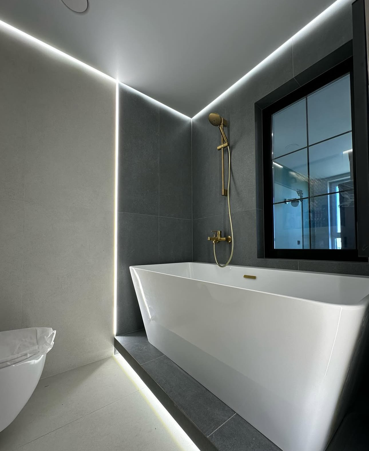 NYC remodeling project featuring full interior renovation with new flooring, modern kitchen, updated bathroom, and custom finishes by licensed contractor.