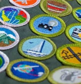 Sew Scout Badge onto Shirt