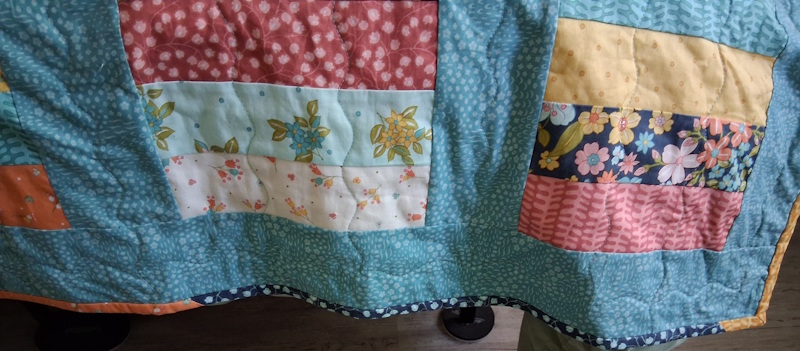 Jelly Roll strips for binding too.