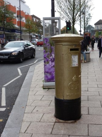 One of the four golden post boxes in Wallington for David Weir, this one on Woodcote Road