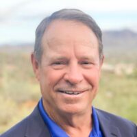 Smiling middle-aged man in outdoor setting