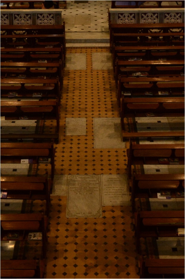 Originally paved Minton-tile flooring from 1928 and the new flooring as seen in the central part of the nave.