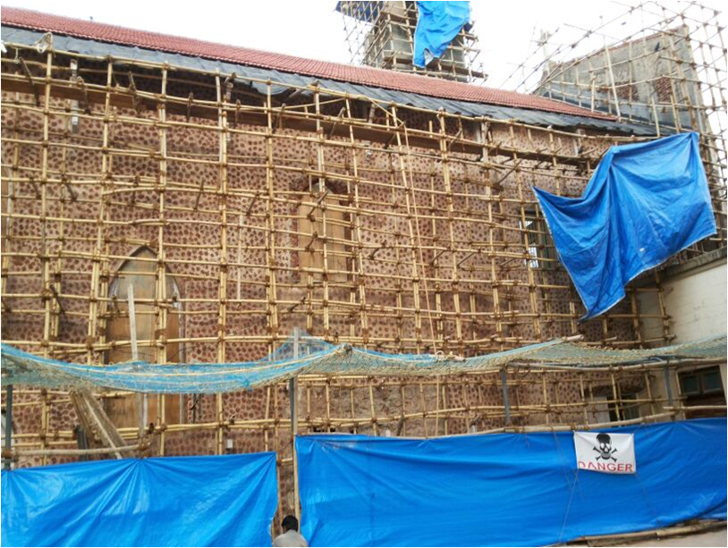 Lime plastering applied to the eastern face using brick pellets and brick dust for final finishing coats.