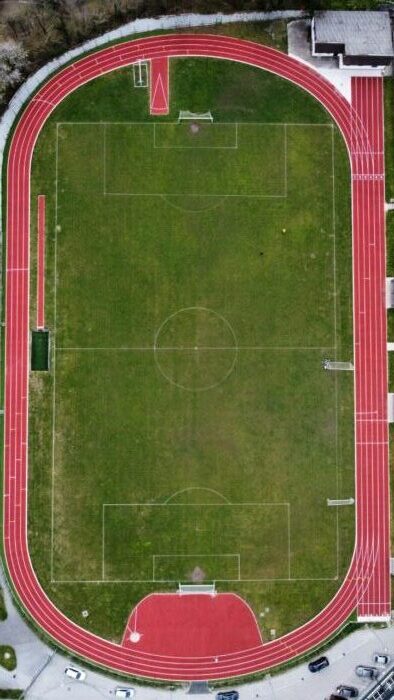 A conventional sports ground layout with the 400m track built around a football field