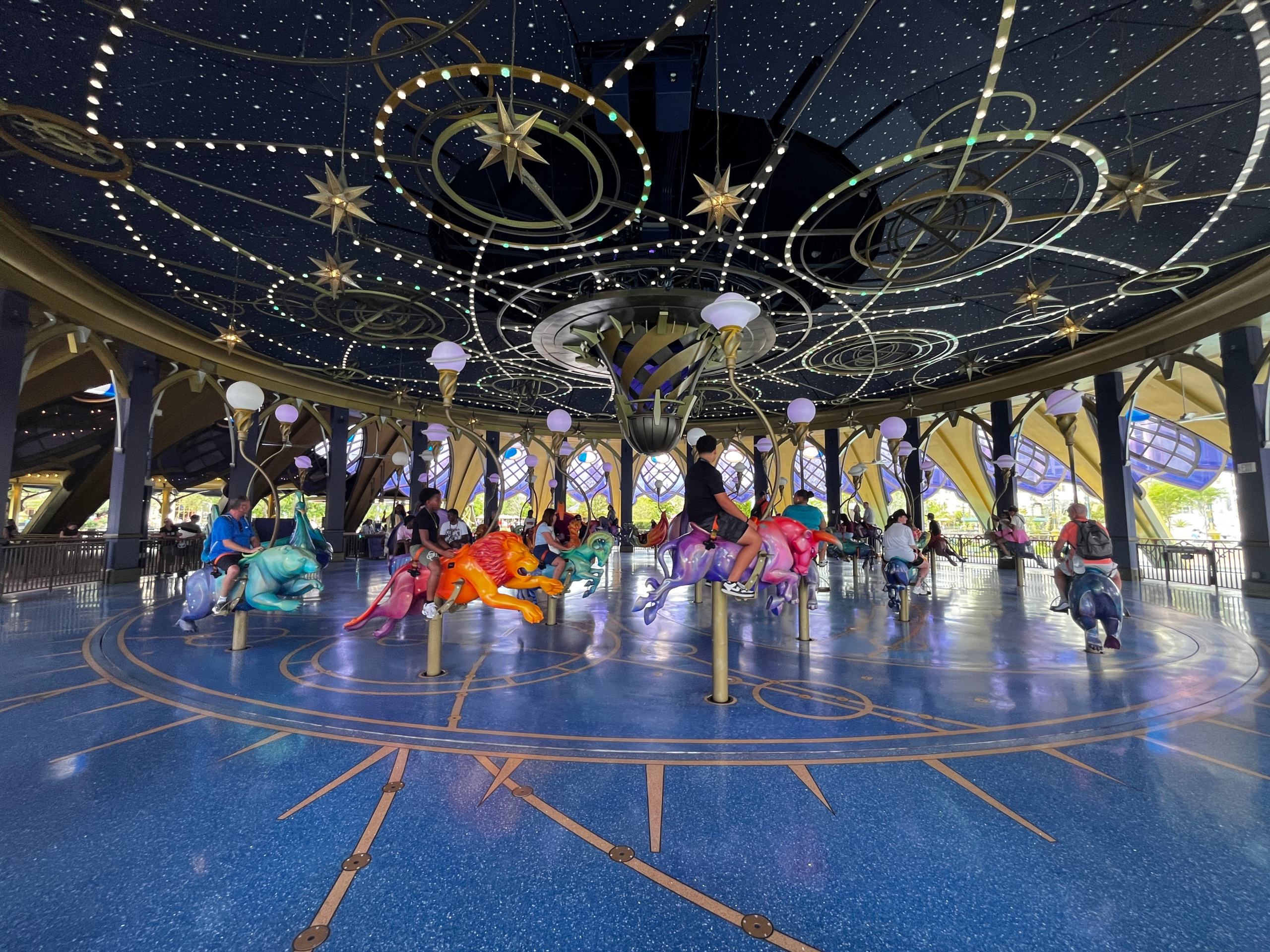 A carousel themed as constellations with vibrant colors.