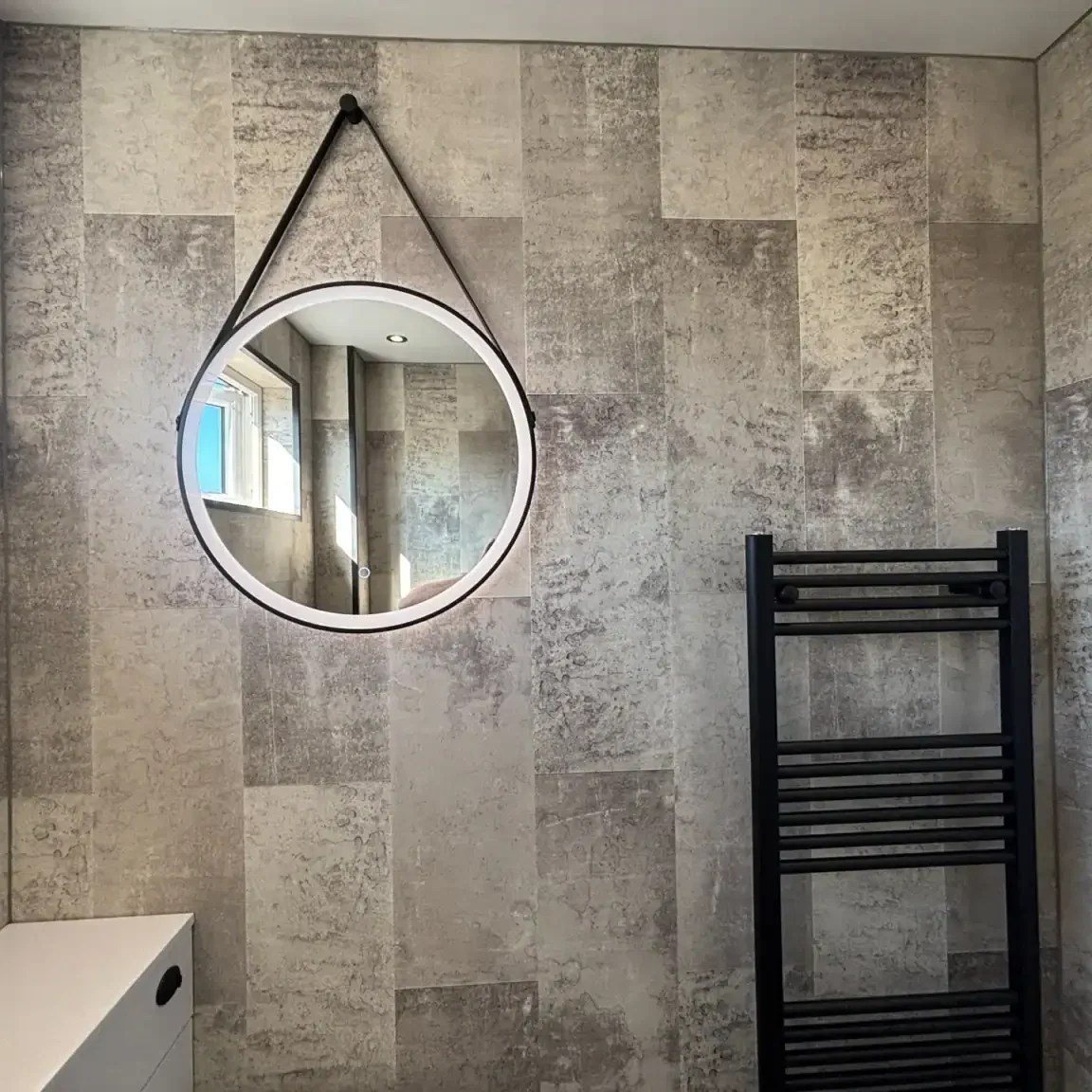 LED Mirror and Radiator Detail LED bathroom mirror and black towel radiator in Spennymoor bathroom