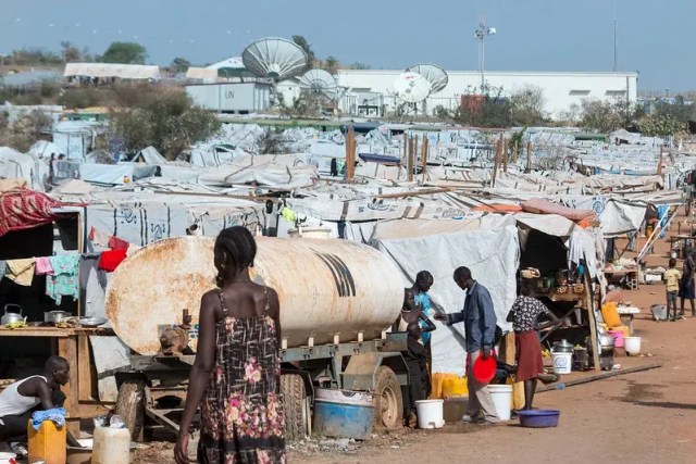 South Sudanese people looking for supplies.