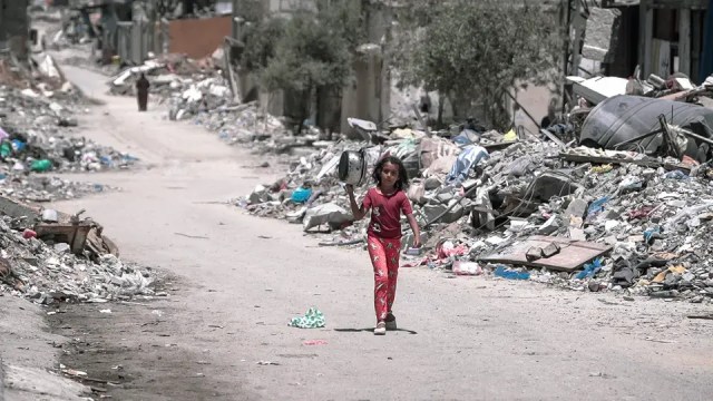 Girl walking in Gaza