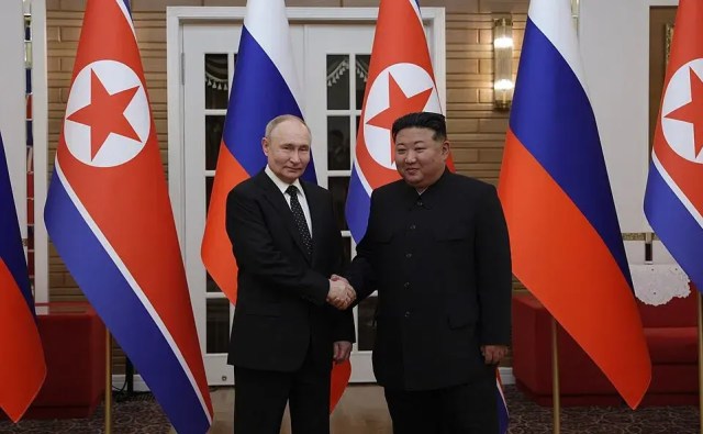 Vladimir Putin and Kim Jong Un