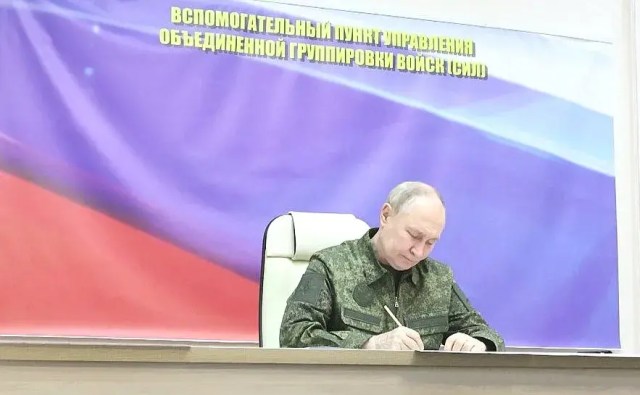 Vladimir Putin in a meeting at a command post of the Kursk group of forces.