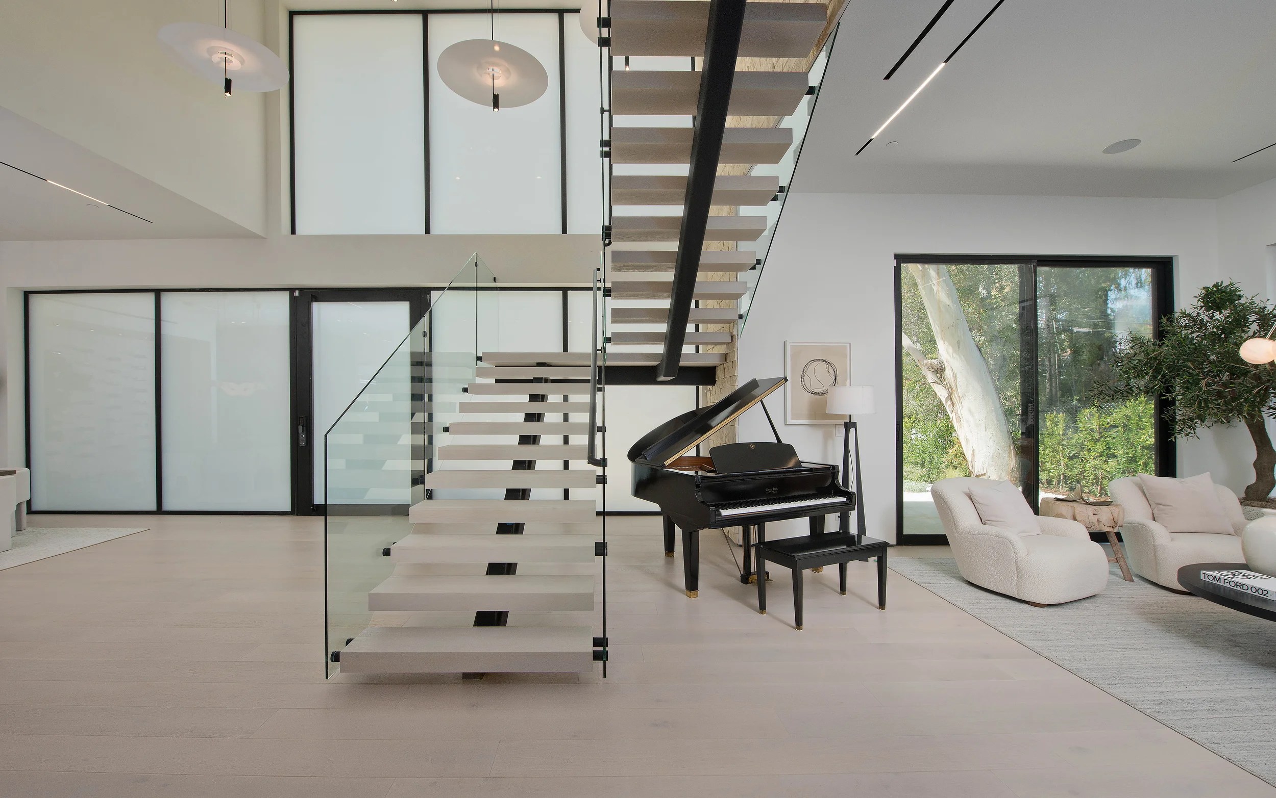 Sophisticated entryway featuring reimagining home security 2025 technology by Interior Conception.