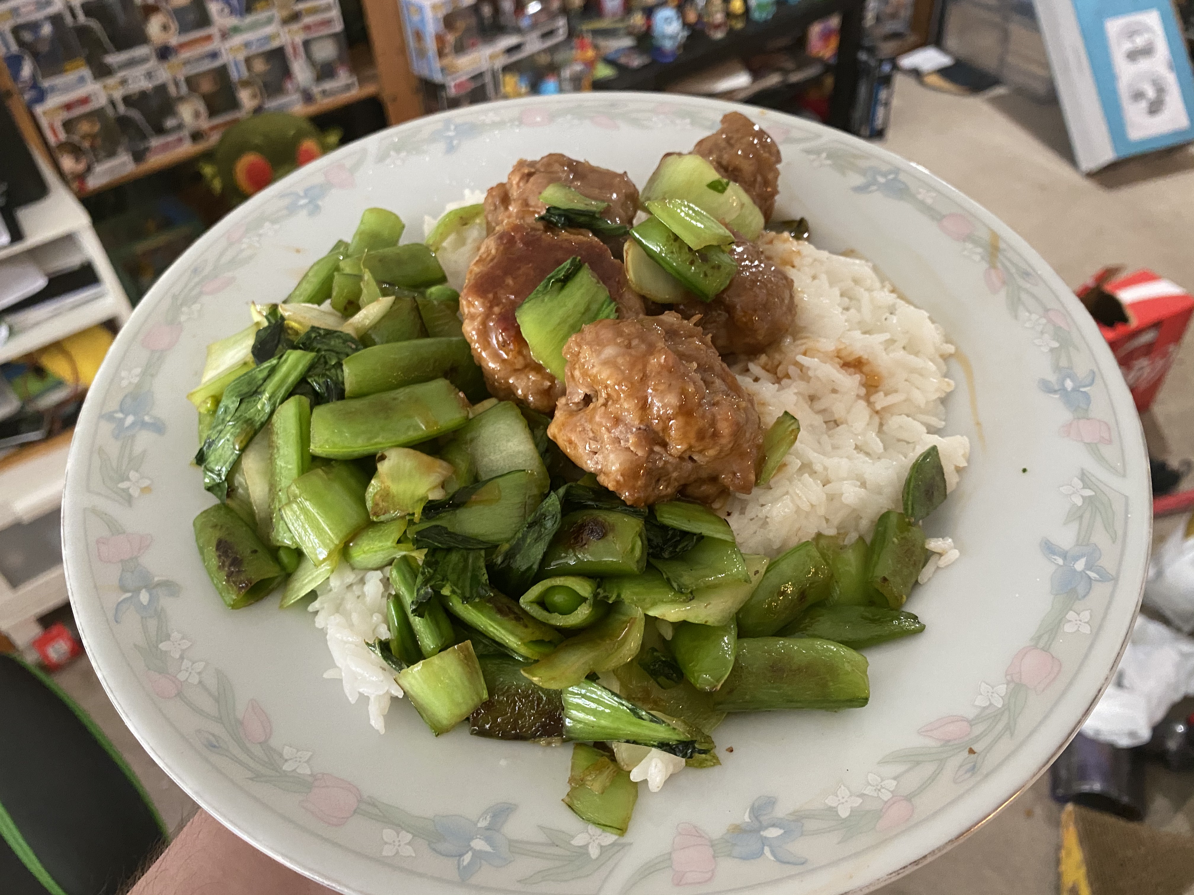 Hoisin-Glazed Pork Meatballs with Stir-fried Snap Peas and Bok Choy on Coconut Rice