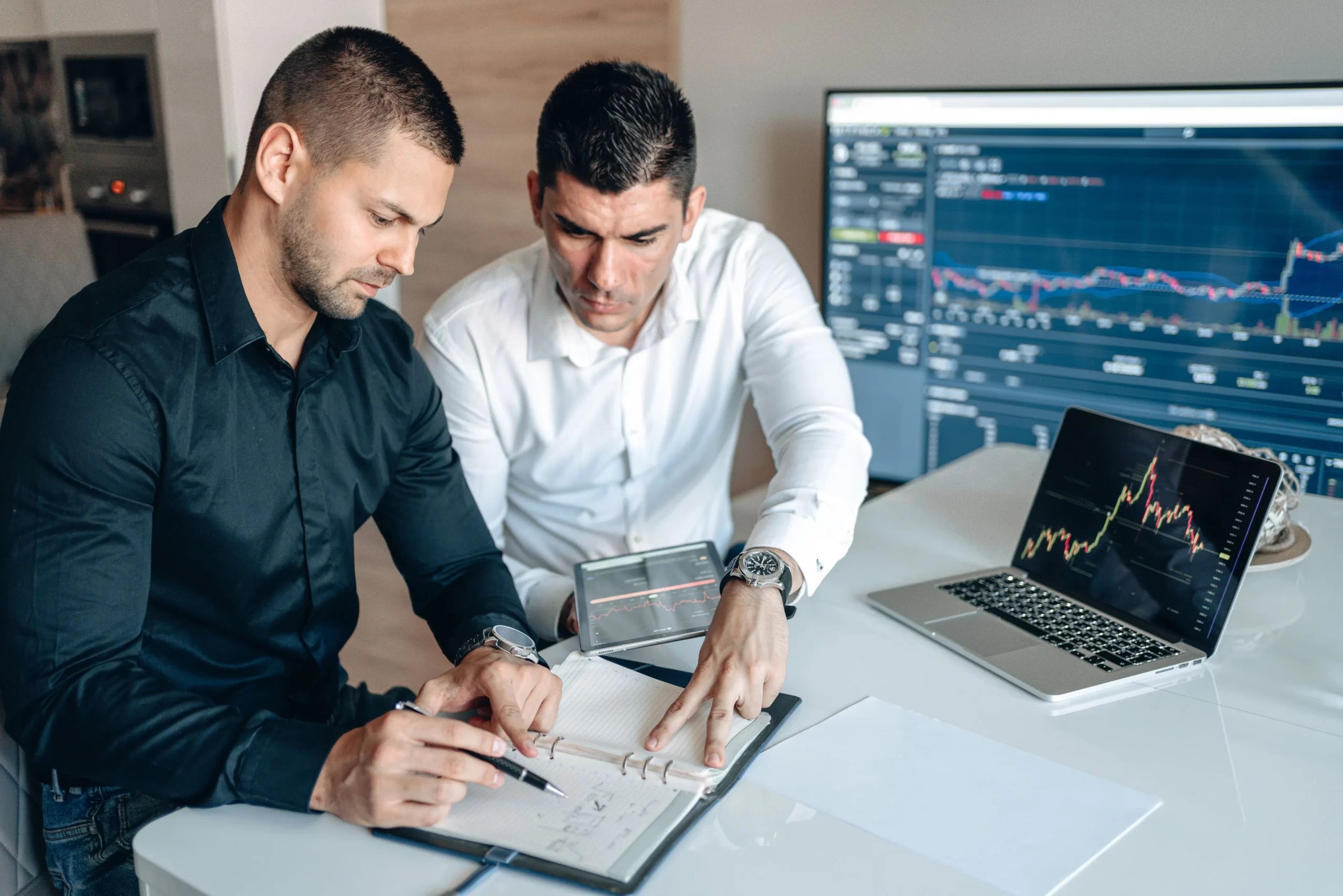 Executives analyzing digital transformation strategy data in a modern office