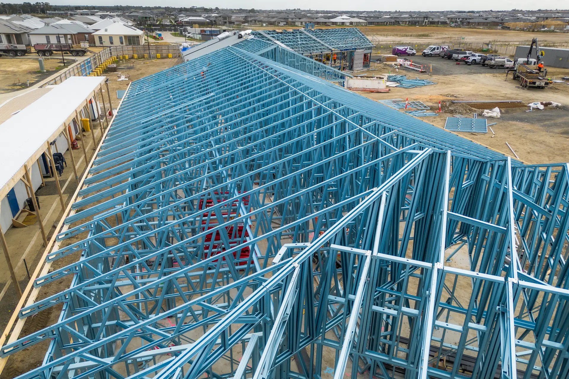 Aerial view of Truecore steel roof trusses at Halcyon Evergreen Clubhouse under construction