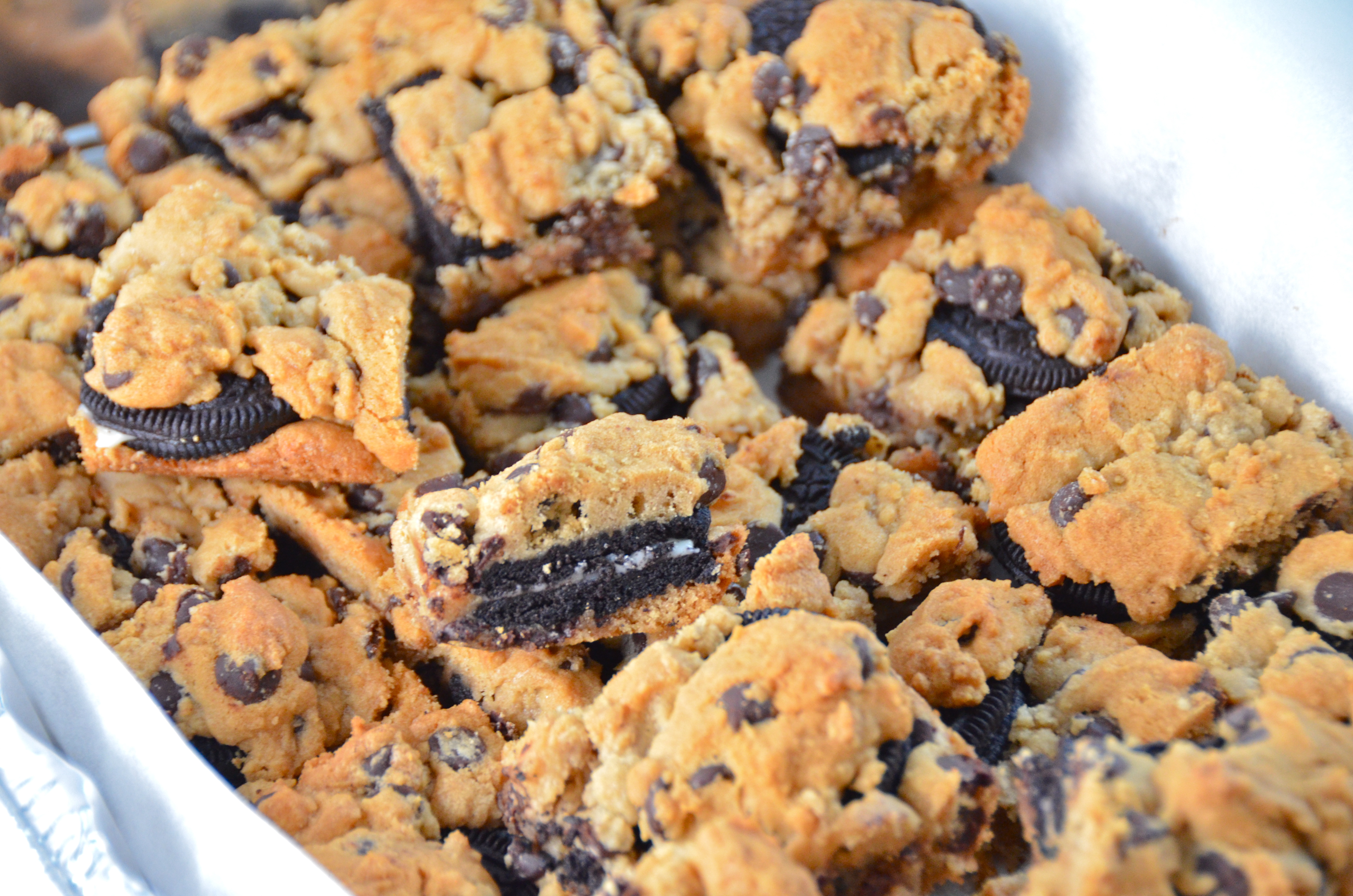 Short And Sweet. 2 Ingredient OreoStuffed Chocolate Chip Cookie Bars. I Sing In The Kitchen