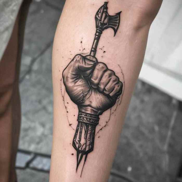 Fist Holding a Spear tattoo