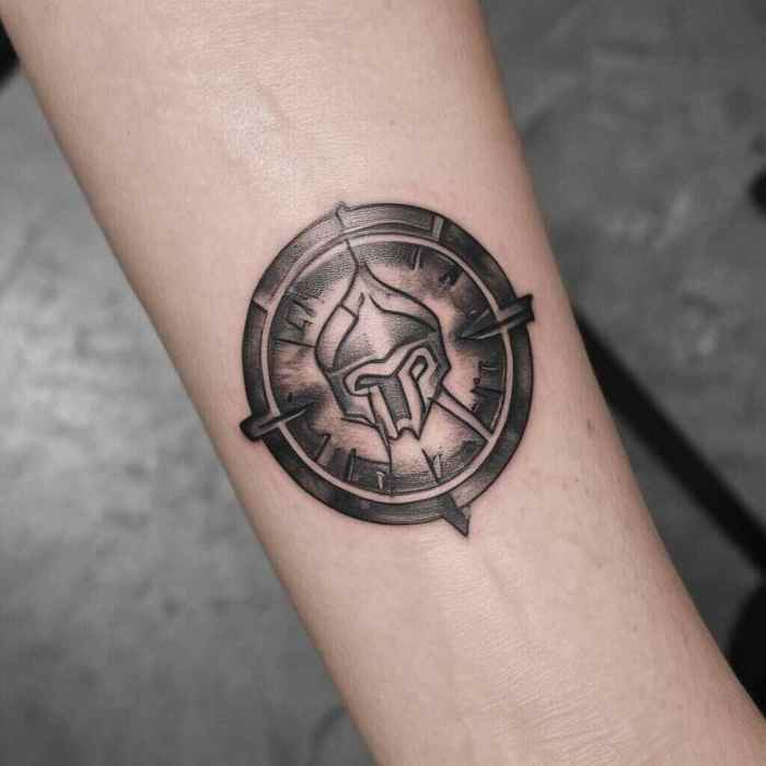 Minimalist Spartan Shield Tattoo