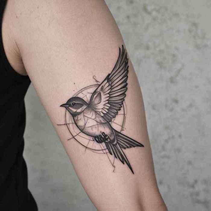 Outlined Swallow tattoo