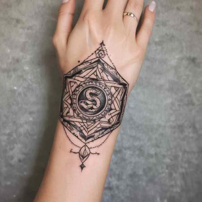 Sacred Geometry Snake tattoo