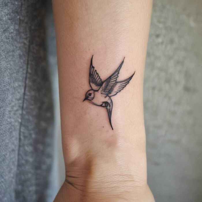 Single Line Swallow tattoo