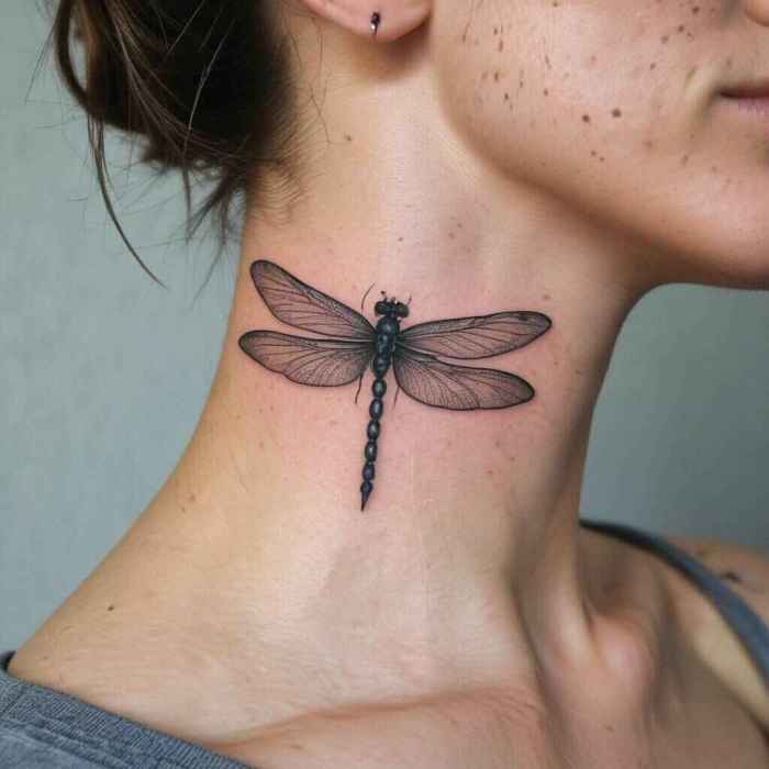 Subtle Dragonfly on the Nape of the Neck tattoo