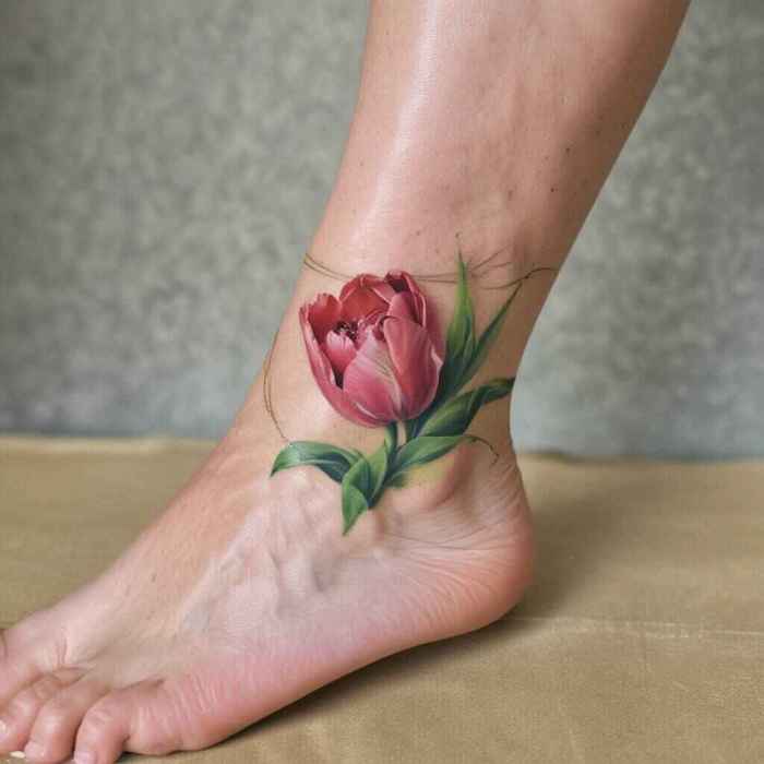 Tulip on the Foot Wrapping Around the Ankle tattoo