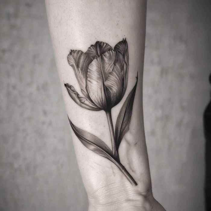 Tulip on the Nape with Stems Extending Down Tattoo