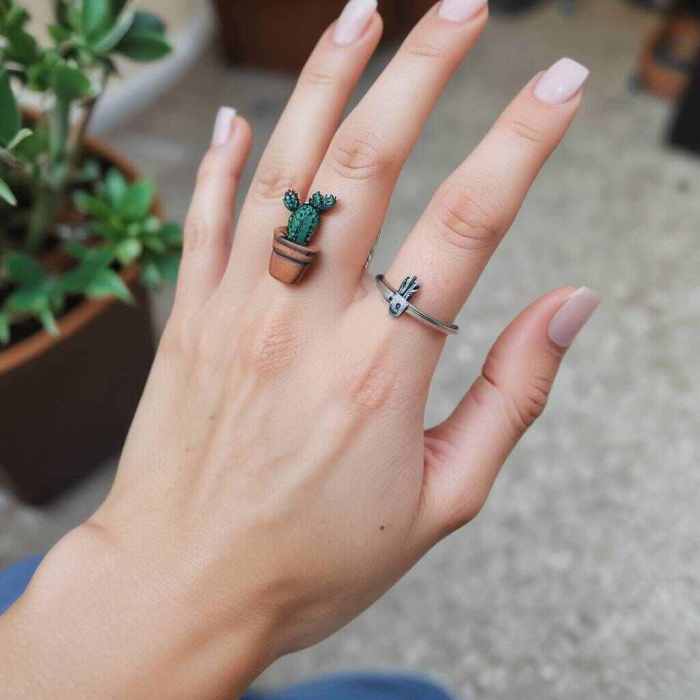 Tiny Cactus on the Finger Tattoo