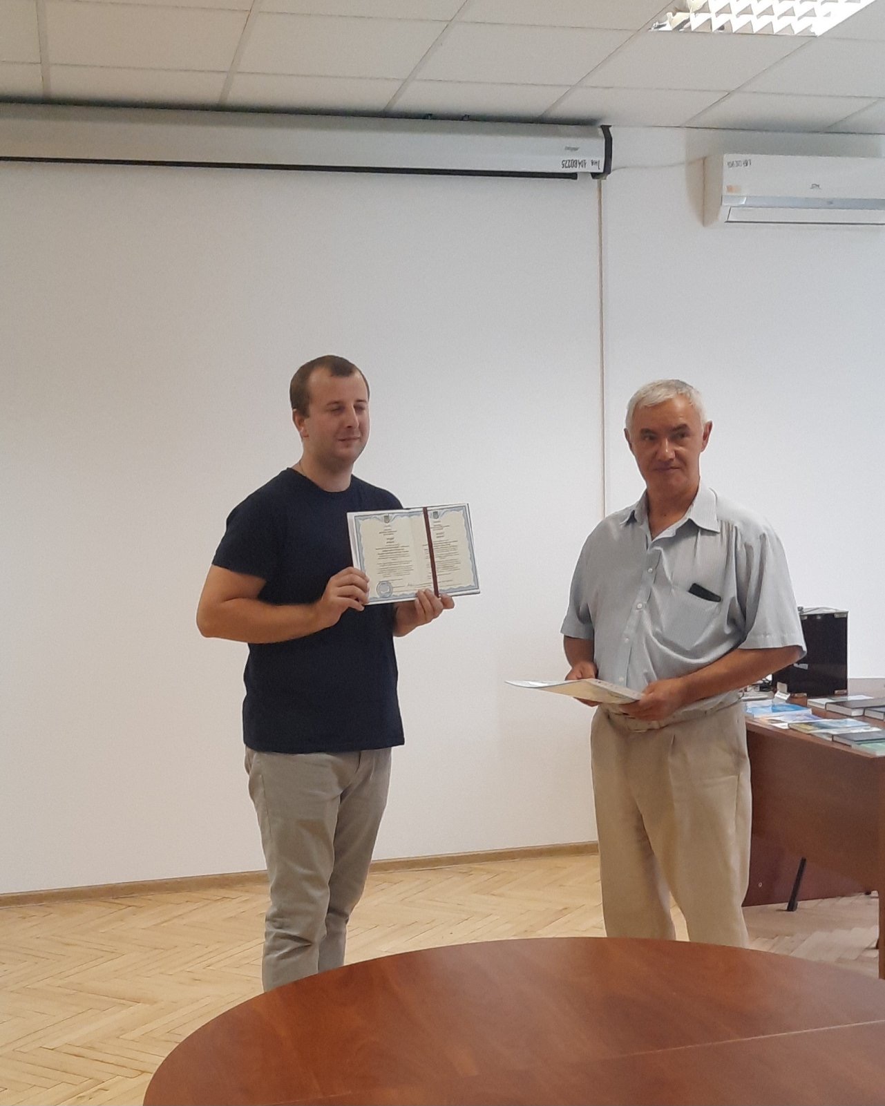 Вручення диплому доктора філософії Буцію Роману Андрійовичу