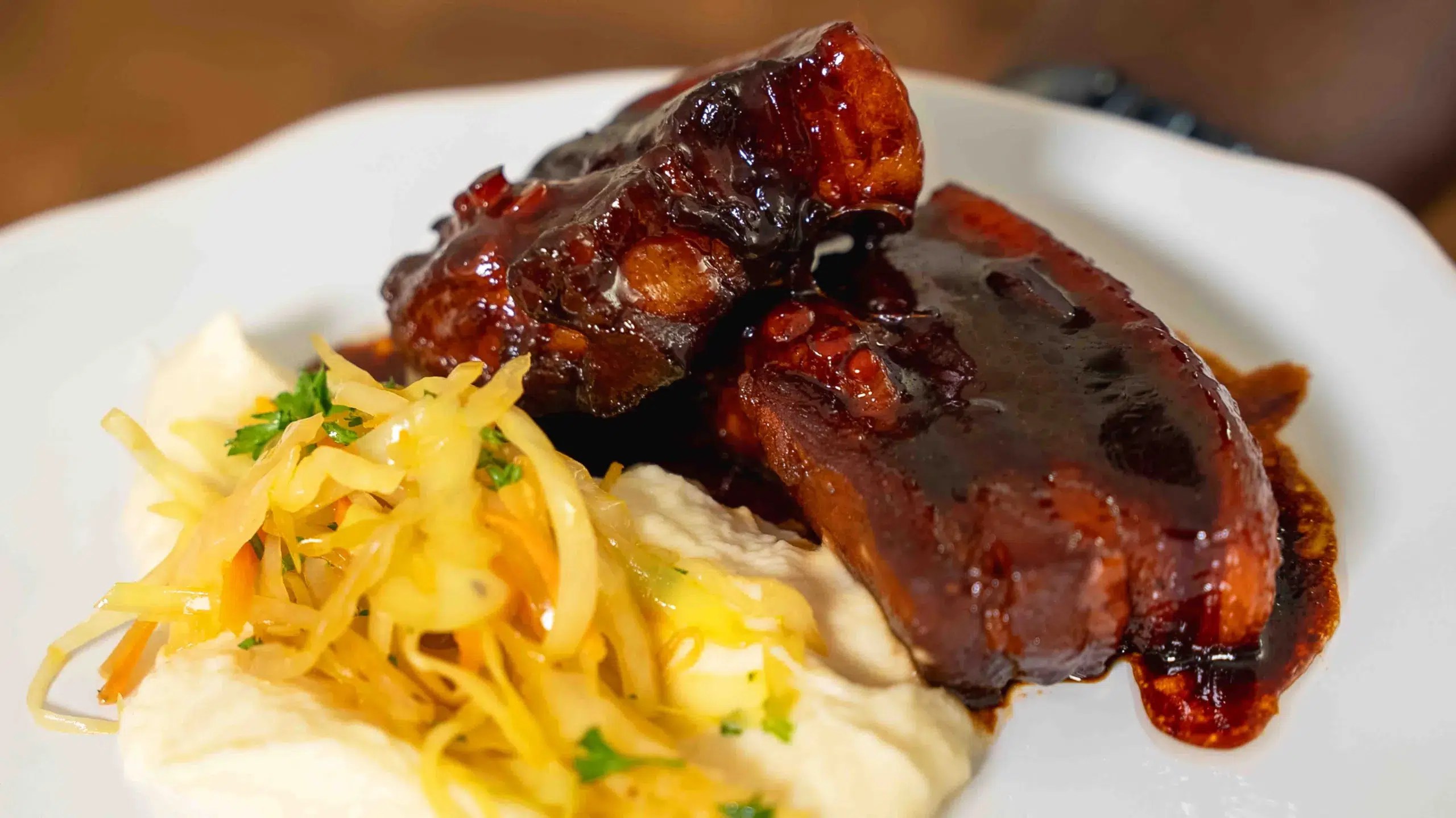 Beer-braised pork belly with celery root purée.