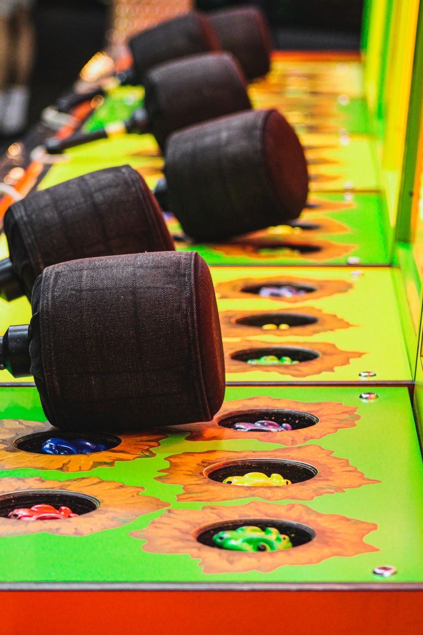 black whack a mole hammers on arcade machines