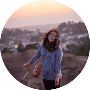 jacklynn standing outside on a hill