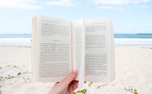 person holding book