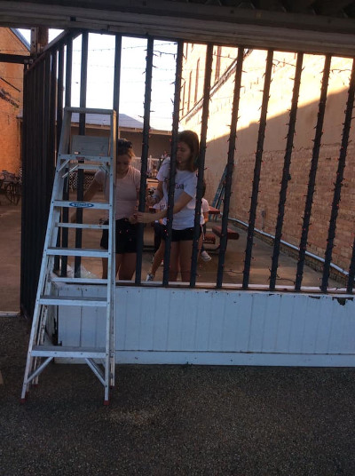 Volunteers turn out in heavy numbers to help decorate downtown